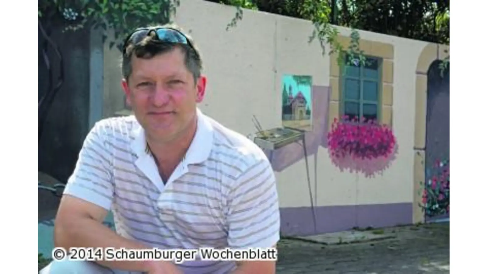 Stadtmerkmale verschönern die einst graue Betonwand (Foto: wa)